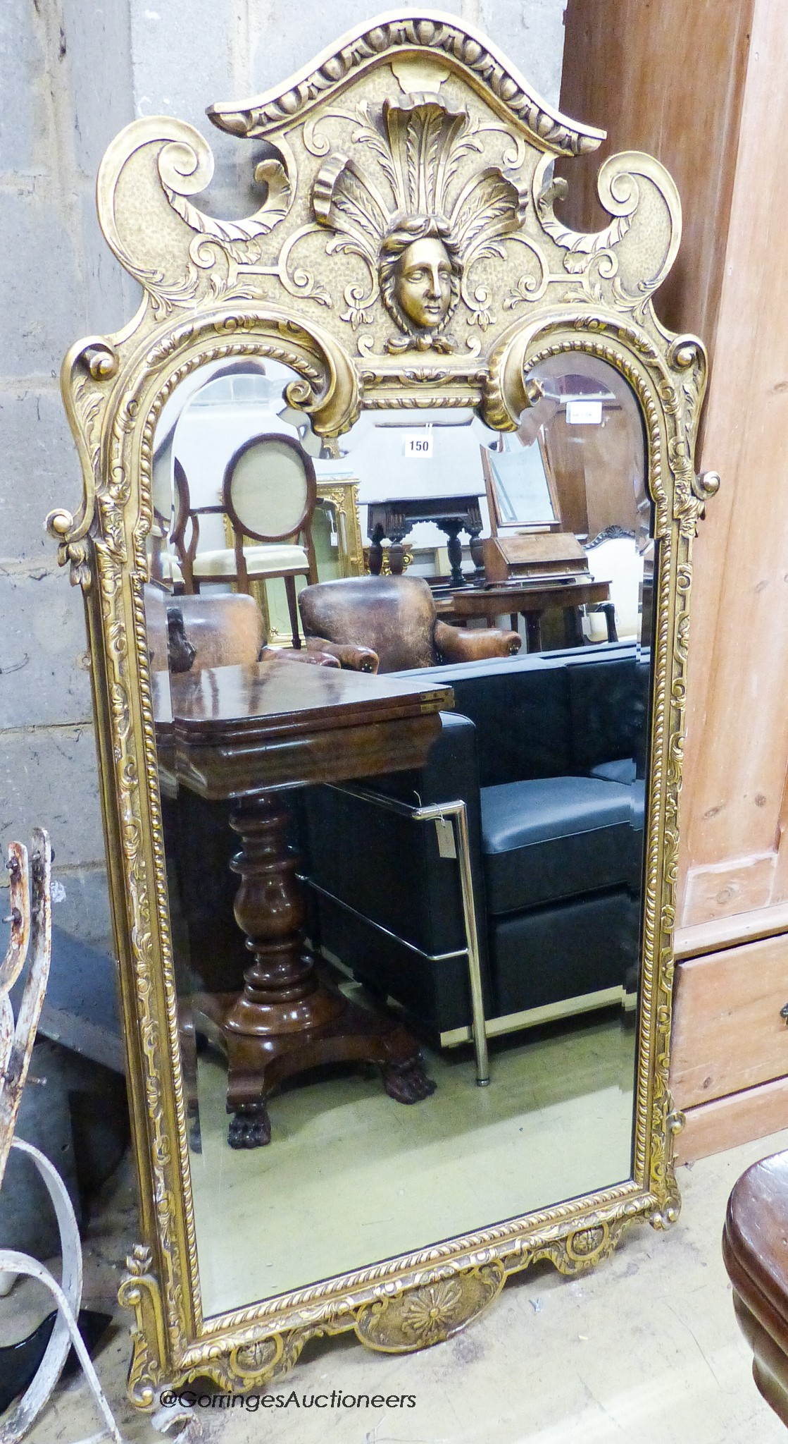 A George I style gilt composition wall mirror, having arched rectangular plate and shaped frame, width 75cm, height 154cm